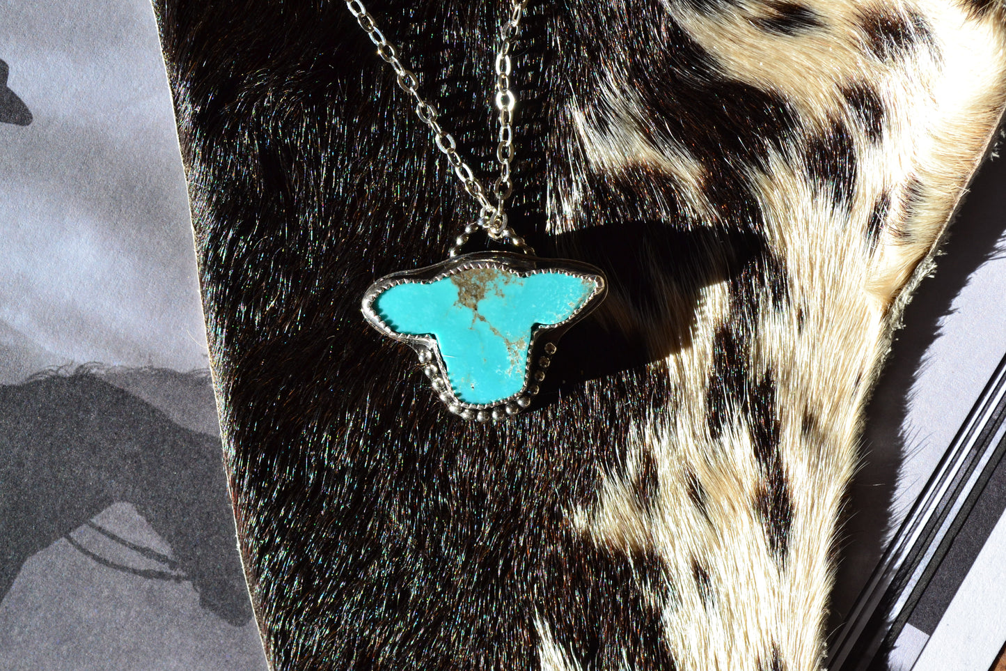 KINGMAN TURQUOISE CATTLE HEAD NECKLACE